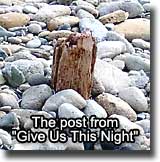 post in sand and rock